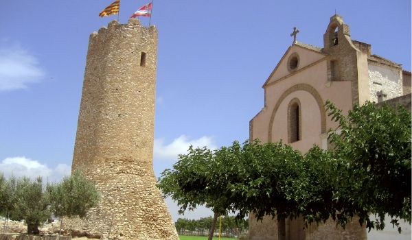 L’Aldea tower, and the Mare de Déu hermitage